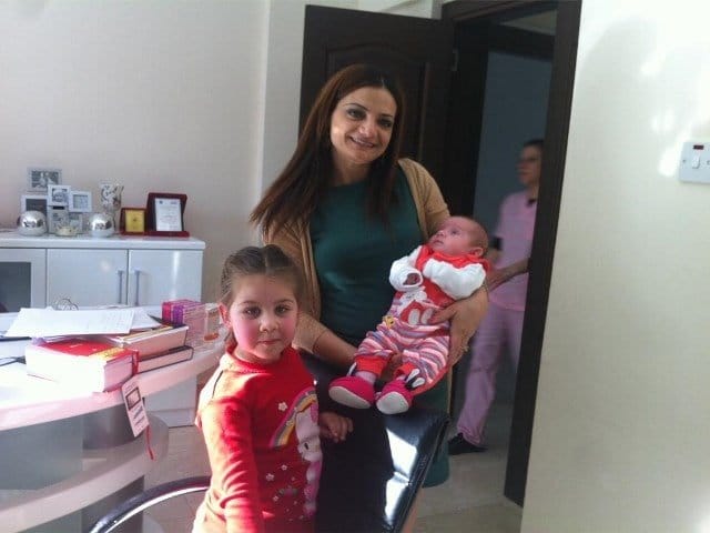 Dr. Mürüde Çakartaş Dağdelen with 2 children