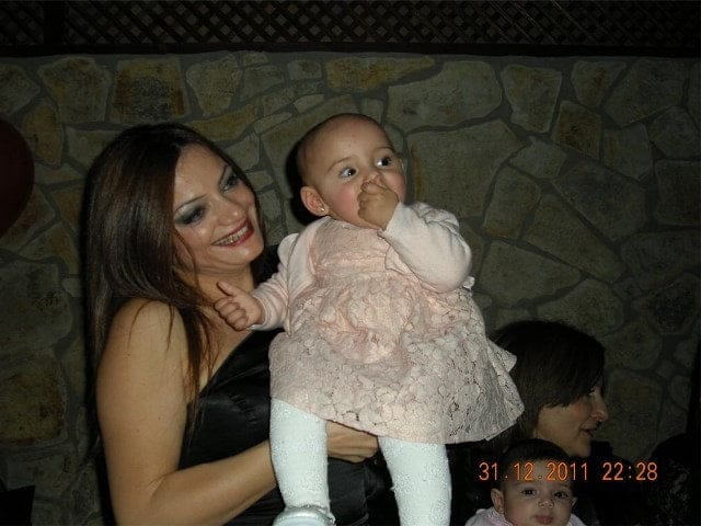 Dr. Mürüde Çakartaş Dağdelen with a baby